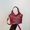Gothic style magenta cross bag in pebbled leather with silver chain and shoulder strap - Red