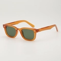 Retro amber square sunglasses with dark green lenses and silver rivets in 45-degree view - Translucent Orange Frame / Dark Green Lens