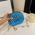 Blue shell-shaped acrylic clutch bag with metallic finish and gold chain strap - Blue