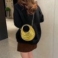 Elegant gold metallic evening clutch with wavy texture and circular handle for party - Gold