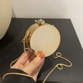 Mini borsa tonda in acrilico dorato di lusso con chiusura ad ape e catena in metallo - Oro