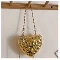 Detail of a heart-shaped gold metallic bag with a unique hammered lava texture and bead chain - Style 2 Gold (Thin Bead Shoulder Strap)