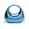 Macro shot of electric blue acrylic bag with mirror finish and golden chain strap - Blue
