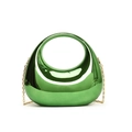 Detail of glossy metallic green moon bag with elegant gold chain strap and hollow design - Green
