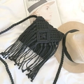 Handmade black macrame crossbody bag featuring long fringe and woven geometric patterns - Black
