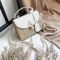 Mini beige straw bag with white faux leather flap and golden flower pendant detail - Off White
