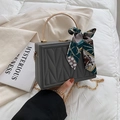 Elegant grey rectangular box bag with V-quilted texture and silk scarf handle detail - Gray