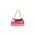 Macro view of metallic pink acrylic evening bag with gold beaded handle and mirror finish - Rose Red
