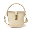 Mini cream bucket bag in pebbled faux leather with gold rotary buckle and strap - Off White