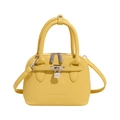 Modieuze gele schelptas met lychee-korreltextuur en metalen slotdetail op de tas - Geel