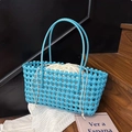 Detail of bright blue woven tote bag with contrast cream drawstring inner pouch - Blue