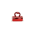 Detail of red metallic cylindrical clutch bag with gold chain and artistic handle - Red