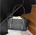 Handwoven black leather tote bag with cream drawstring liner and spacious design - Black