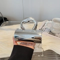 Silver metallic cylinder evening bag with thick top handle and detachable chain strap - Silver