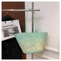 Macro detail of the woven texture and mint green gradient design on this tote bag - Sky Blue