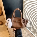 Brown lychee texture leather bucket bag with white plush rabbit charm and shoulder strap - Dark Brown With Pendant