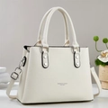 Minimalist white lychee leather tote bag with silver hardware for chic commuting style - Off-white