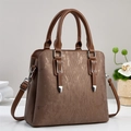 Brown textured women's handbag with gold accents and detachable shoulder strap - Coffee