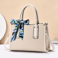 Beige woven tote bag with cream leather trim, golden rivets and a floral scarf handle - Off-white