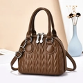 Brown quilted bowling handbag with dual handles and adjustable strap for women - Chocolate Brown