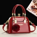 Elegant red patent leather handbag with gold hardware and rose charm for women - Red