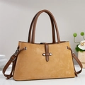 Ginger yellow matte leather crossbody handbag with brown straps shown on a clean white surface - Khaki/Earth Yellow
