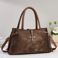 Vintage dark brown trapezoid handbag with adjustable strap and rivet buckle details - Coffee