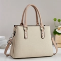 Vintage beige canvas tote bag with brown leather straps and silver hardware detail - Apricot