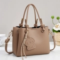 Brown lychee grain leather handbag with puppy pendant and adjustable shoulder strap - Khaki