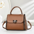 Brown lychee leather crossbody bag with top handle and silver triangle push-lock - Brown