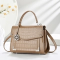 Chic khaki embossed crossbody bag with glossy patent leather and floral charm detail - Khaki
