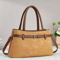 Chic ginger suede tote bag with brown leather trim and silver buckle shown in front view - Khaki/Earth Yellow