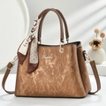 Brown textured leather handbag with decorative silk scarf and detachable shoulder strap - Khaki/Earth Yellow