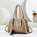 2025 minimalist structured handbag in tan with brushed texture and beaded tassel charm - Coffee