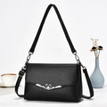 Borsa a tracolla nera classica con fibbia a cuore argento in elegante pelle testurizzata - Nero