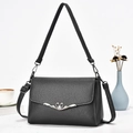 Elegante borsa a tracolla nera in pelle martellata con chiusura a cuore in argento puro - Grigio
