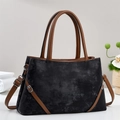Vintage black and brown leather tote bag with long shoulder strap and top handles - Black