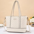 Elegant cream quilted tote bag with dual handles and metal detail for women - Off-white