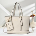 Close-up of beige woven texture tote bag with Danbaoly gold logo and small pouch - Off-white