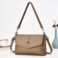Luxury brown leather tote bag with golden leaf clasp and adjustable shoulder straps - Khaki