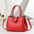 Elegant red handbag with rhinestone detail, featuring top handles and detachable strap - Red
