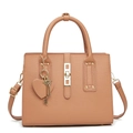 Front view of salmon pink leather handbag with lychee texture and heart charm accessories - Pink