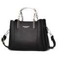 Bolso de mano clásico de cuero negro con asas doradas y correa de hombro ajustable - Negro