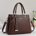 Deep brown lychee pattern tote bag with top handles and adjustable shoulder strap - Coffee