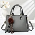 Grey textured handbag with V-shaped pattern and golden hardware for daily commute - Gray