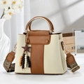Chic beige and brown crossbody bag with gold metal handle and colorful woven strap - Off-white