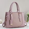 Elegant lavender faux leather handbag with textured panel and adjustable strap - Pink Purple