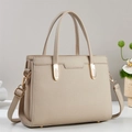Beige pebble leather tote bag with gold hardware and adjustable crossbody strap - Khaki