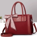 Burgundy woven tote bag with top handle and floral scarf on a minimalist studio backdrop - Wine Red