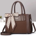 Detail of dark brown tote bag with knit texture, leather panel and decorative silk scarf - Coffee